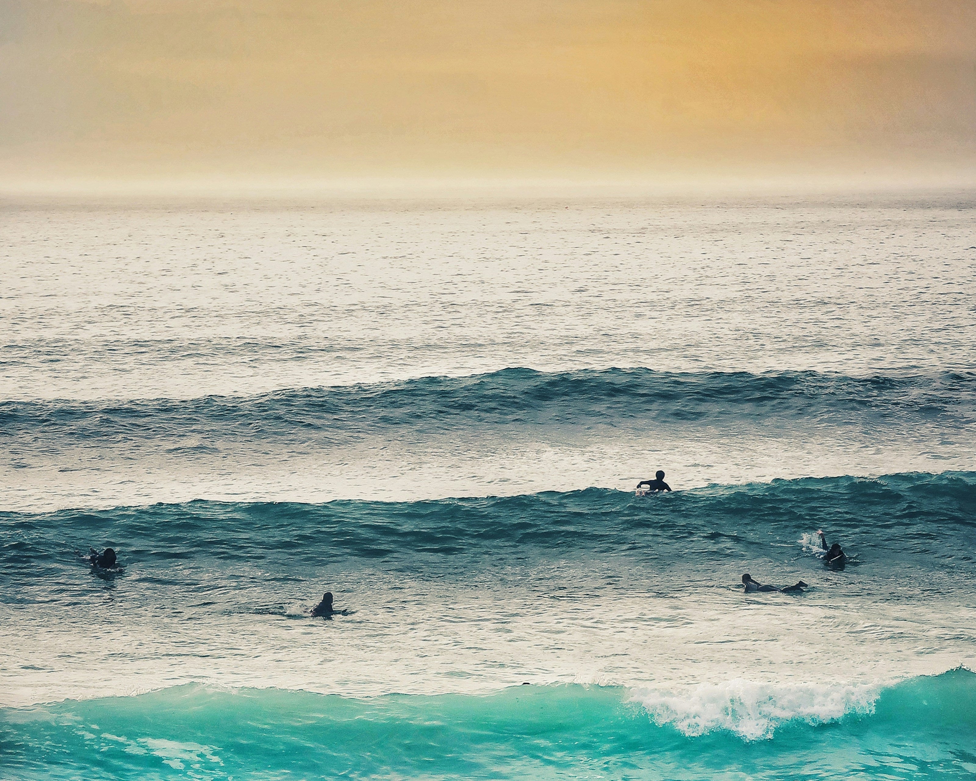 waves at sunset on fistral beach cornwall